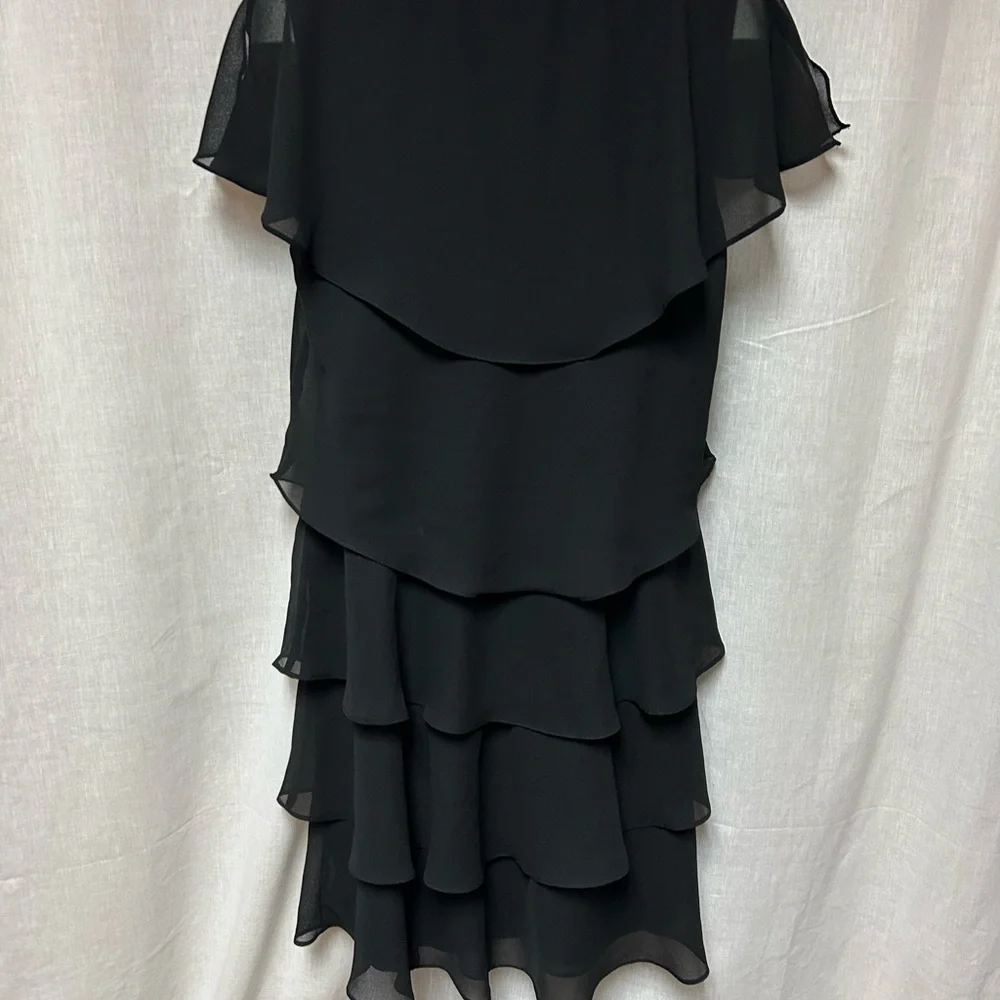 Black tiered sassy dress 
Cruise 
Hem 40” 23” armpit to armpit flat 
Size 18 - Picture 5 of 13